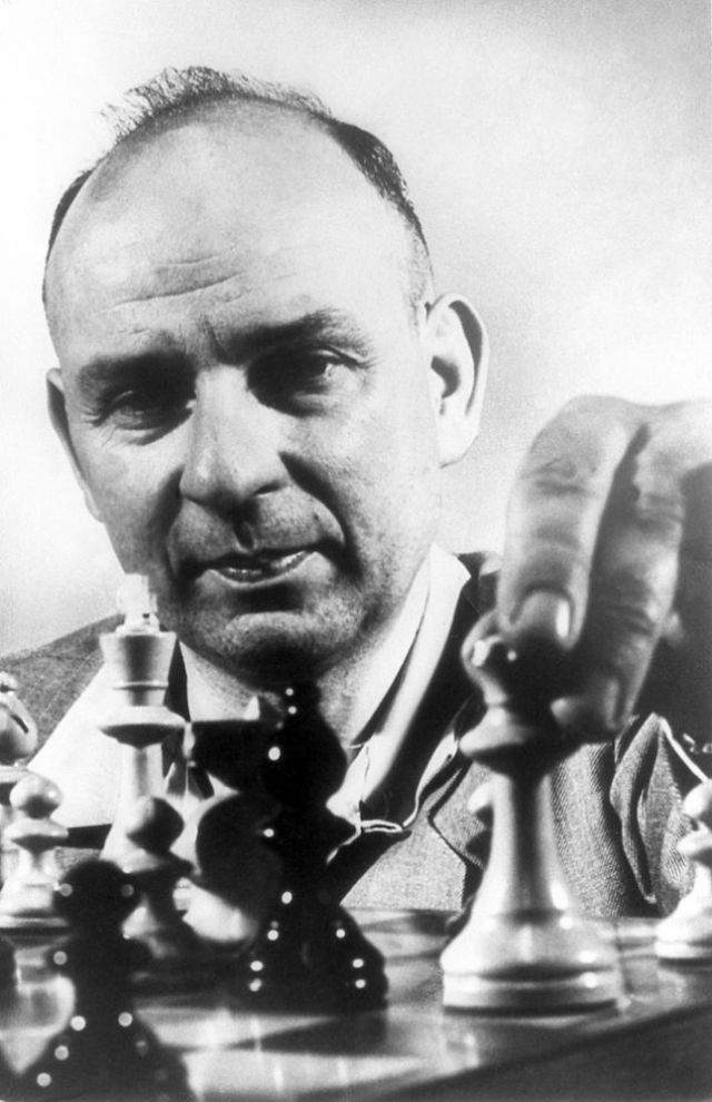 2013-january-february-1859-magazine-oregon-history-chess-grandmaster-arthur-dake-Portland-1950-close-up-moving-chess-piece-lead-photo-size_fitbox_640x1200